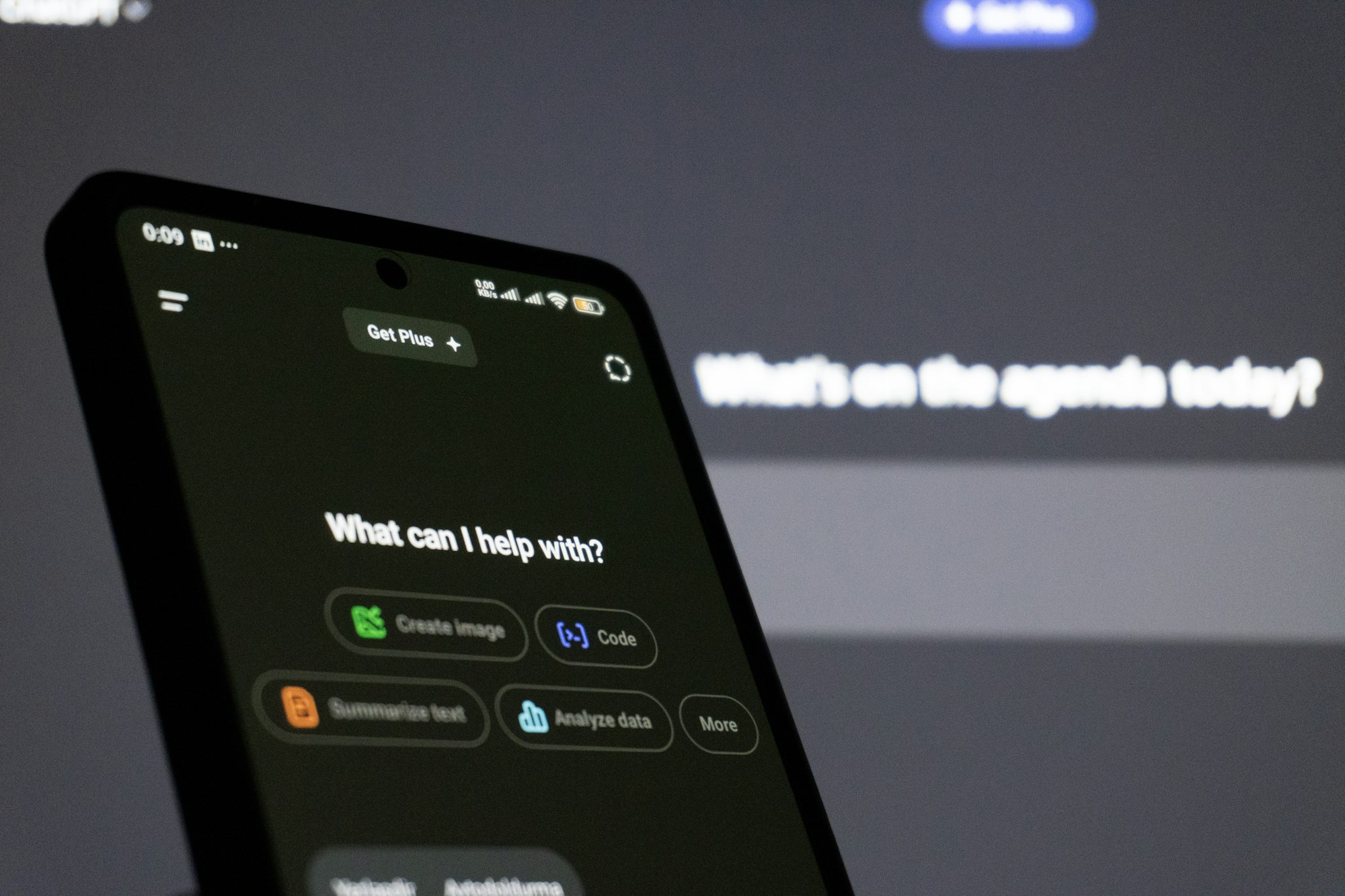 Smartphone showing an AI assistant chat interface